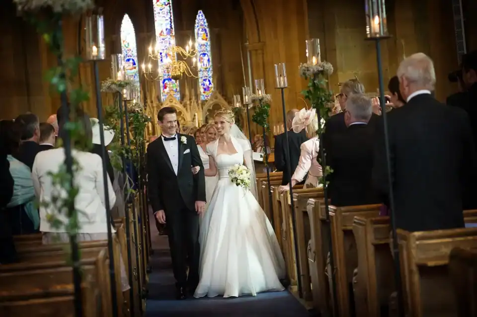 Bride and groom walk down the aisle in church - Scott Gilbert Wedding Photography
