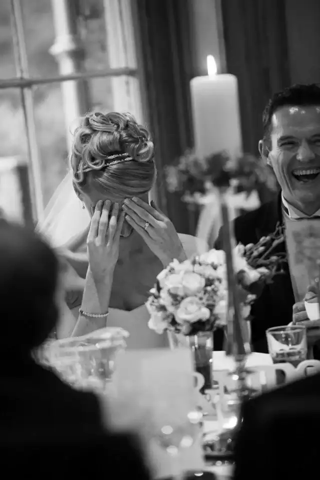 Lucy & Michael 5 Bride laughs and seems embarrassed - Scott Gilbert Wedding Photography