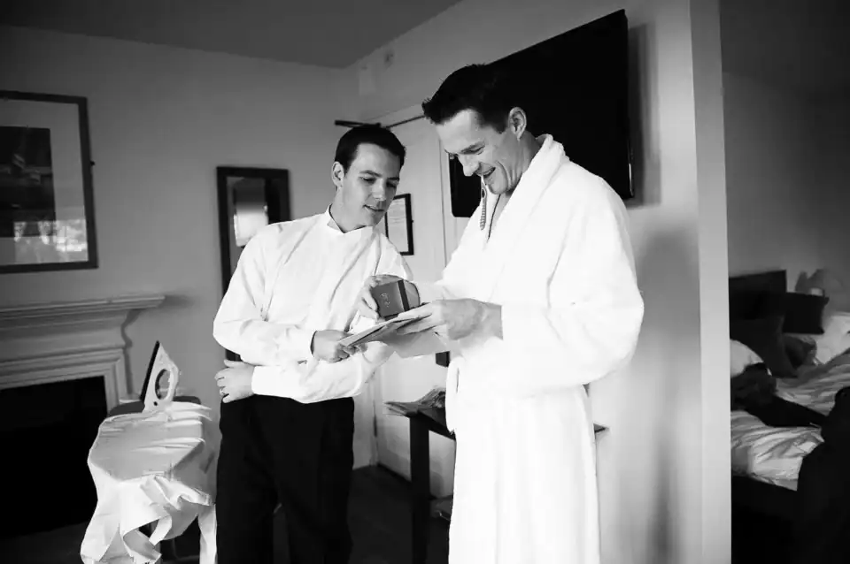 Lucy & Michael 18 Groom checks he has the wedding ring in the bedroom - Scott Gilbert Wedding Photography