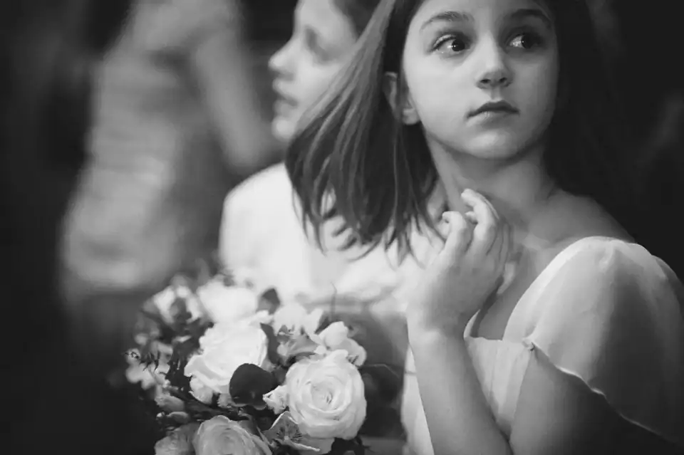 Bridemaid holds flowers and eagerly awaits brides entry - Scott Gilbert Wedding Photography