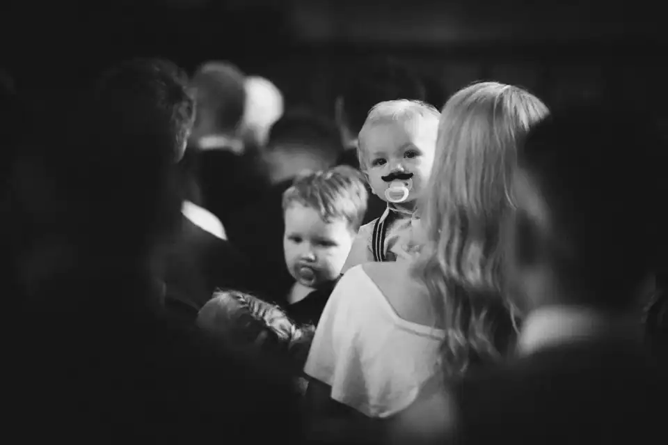 Baby attends wedding with dummy in mouth - Scott Gilbert Wedding Photography