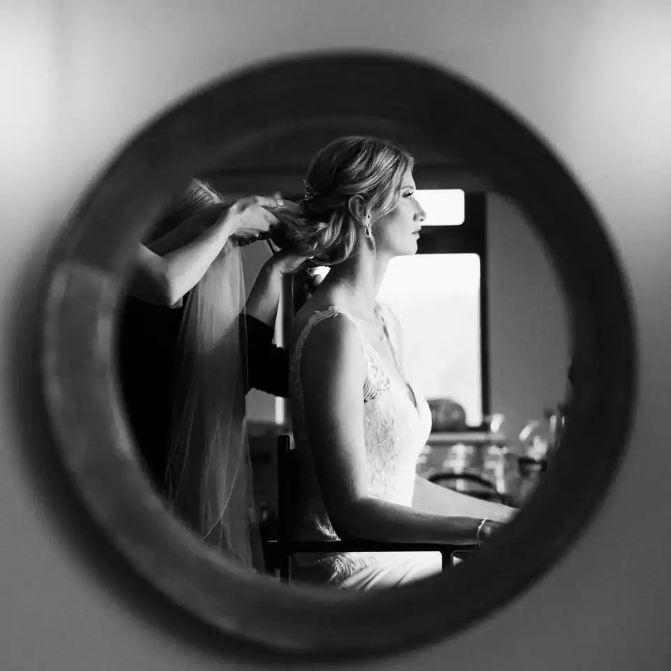 Bride gets her hair perfected - Scott Gilbert Wedding Photography