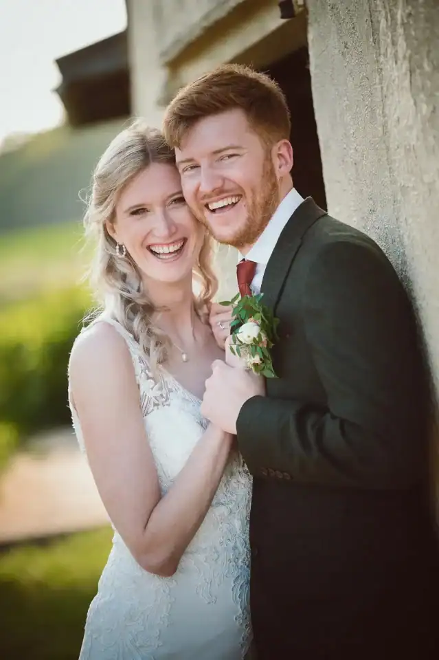 Bride and groom share a laugh and a smile after ceremony - Scott Gilbert Wedding Photography