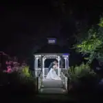 Bridal couple share first kiss at Sheene Mill Cambridgeshire - Scott Gilbert Wedding Photography