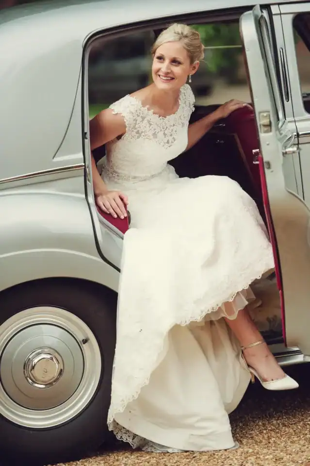 Bride steps out of wedding car - Scott Gilbert Wedding Photography
