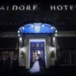 Happy couple gaze into each others eyes outside Waldorf Hotel London - Scott Gilbert Wedding Photography