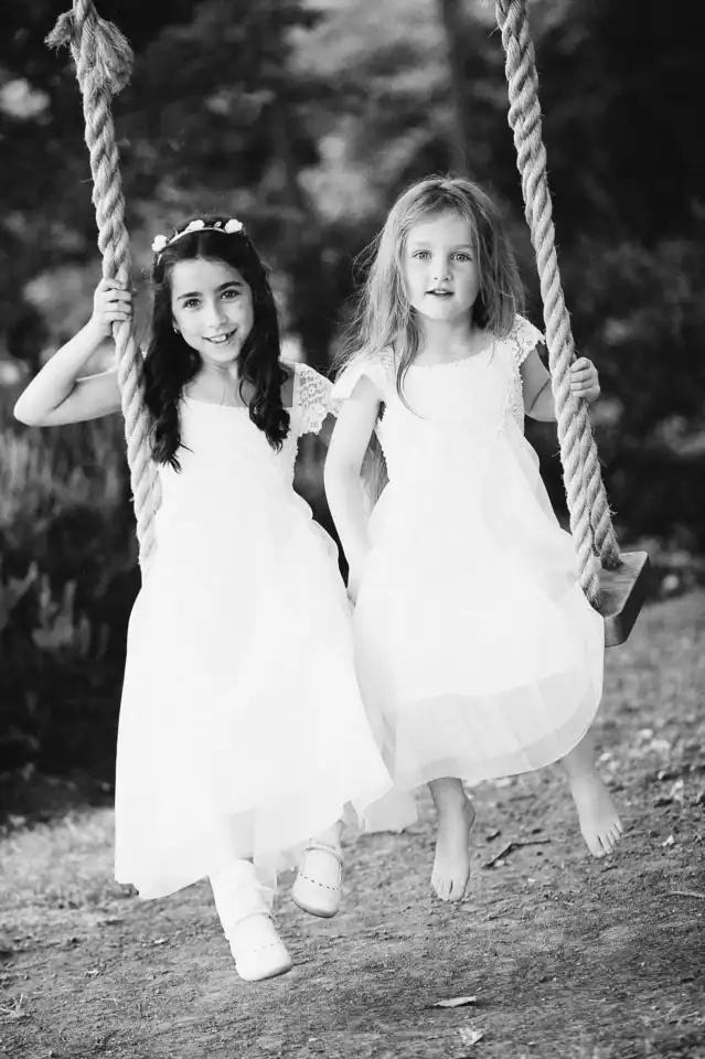 Bridemaids swing on rope swing - Scott Gilbert Wedding Photography