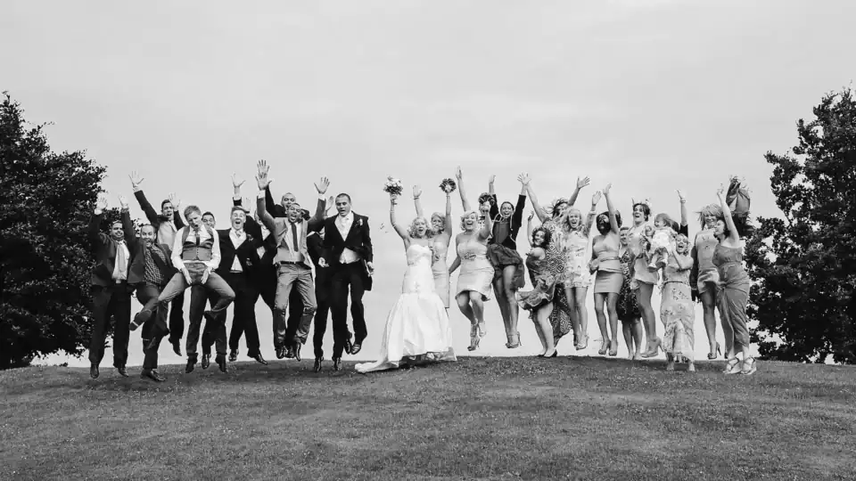 Wedding party jump for a wonderful shot - Scott Gilbert Wedding Photography